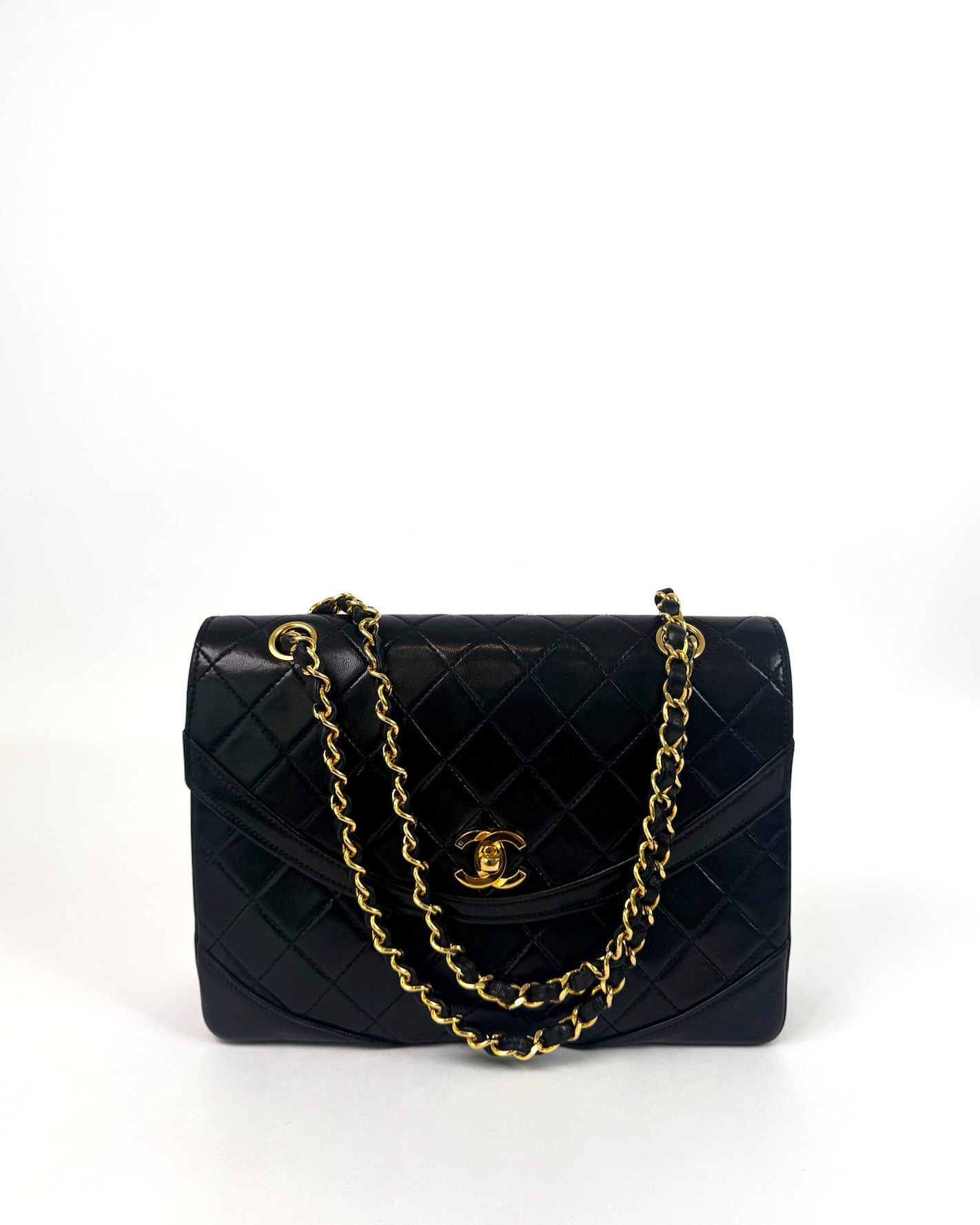 Vintage Chanel Curved Flap Bag in Black Lambskin with 24k Gold Hardware