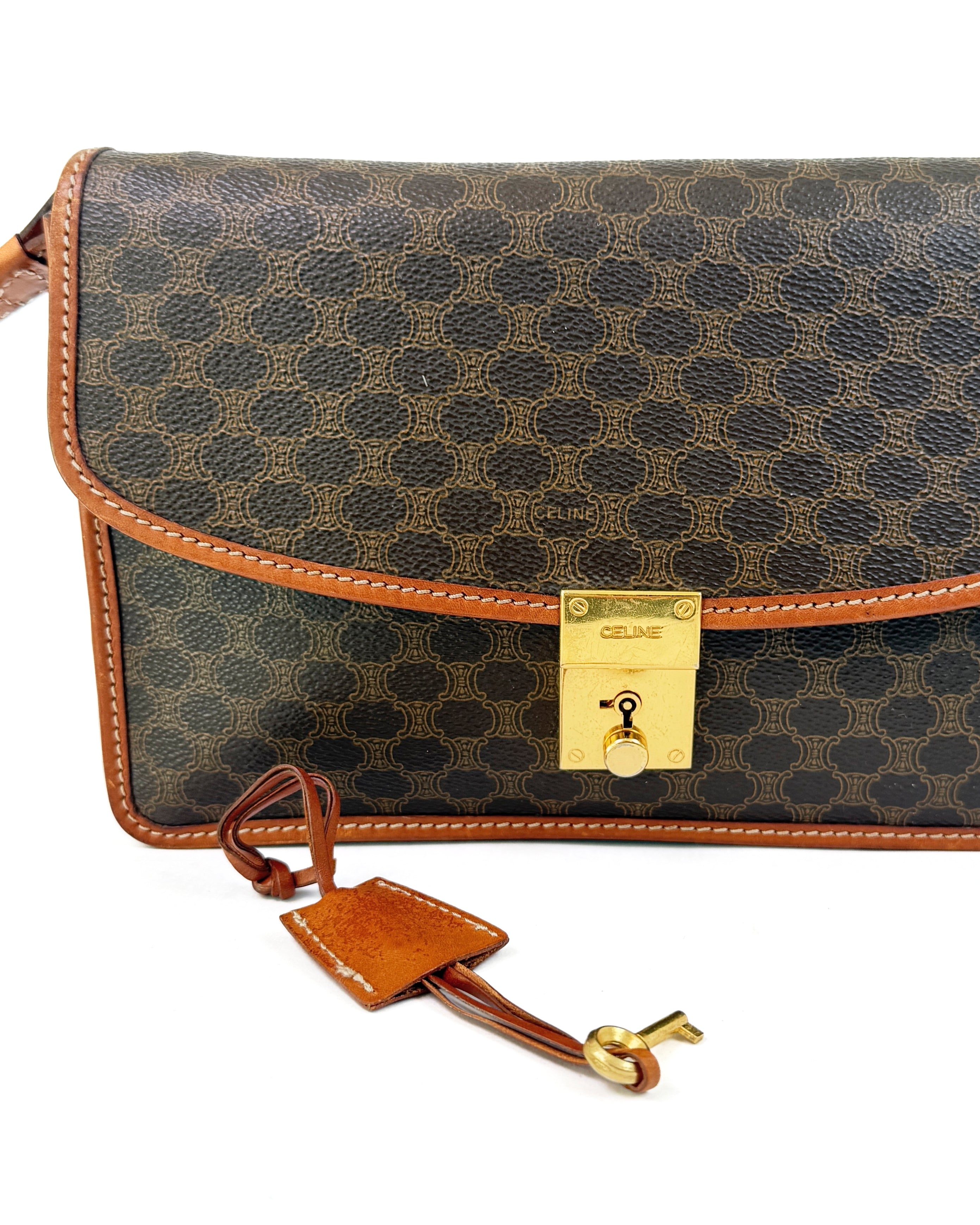 Céline Macadam Lock Wristlet Clutch