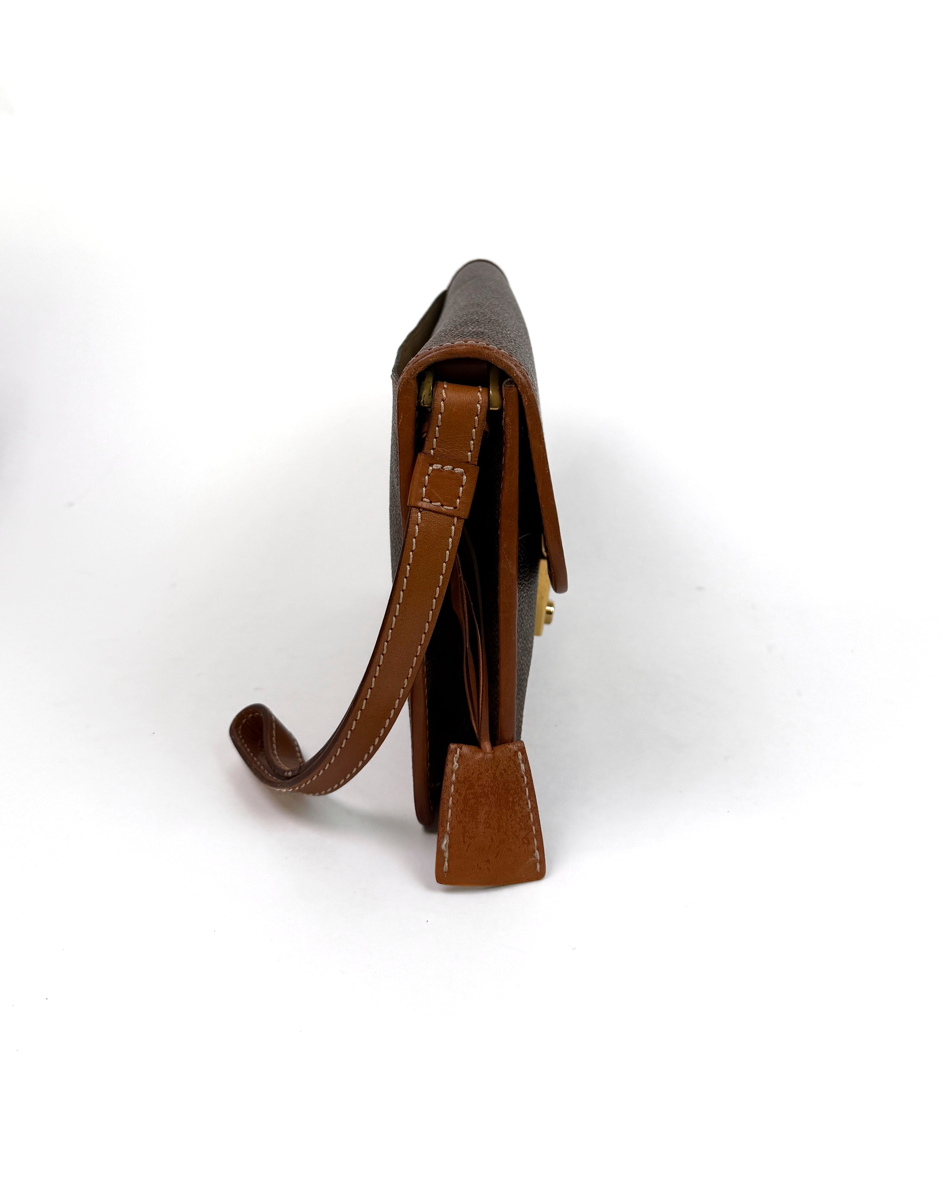 Céline Macadam Lock Wristlet Clutch
