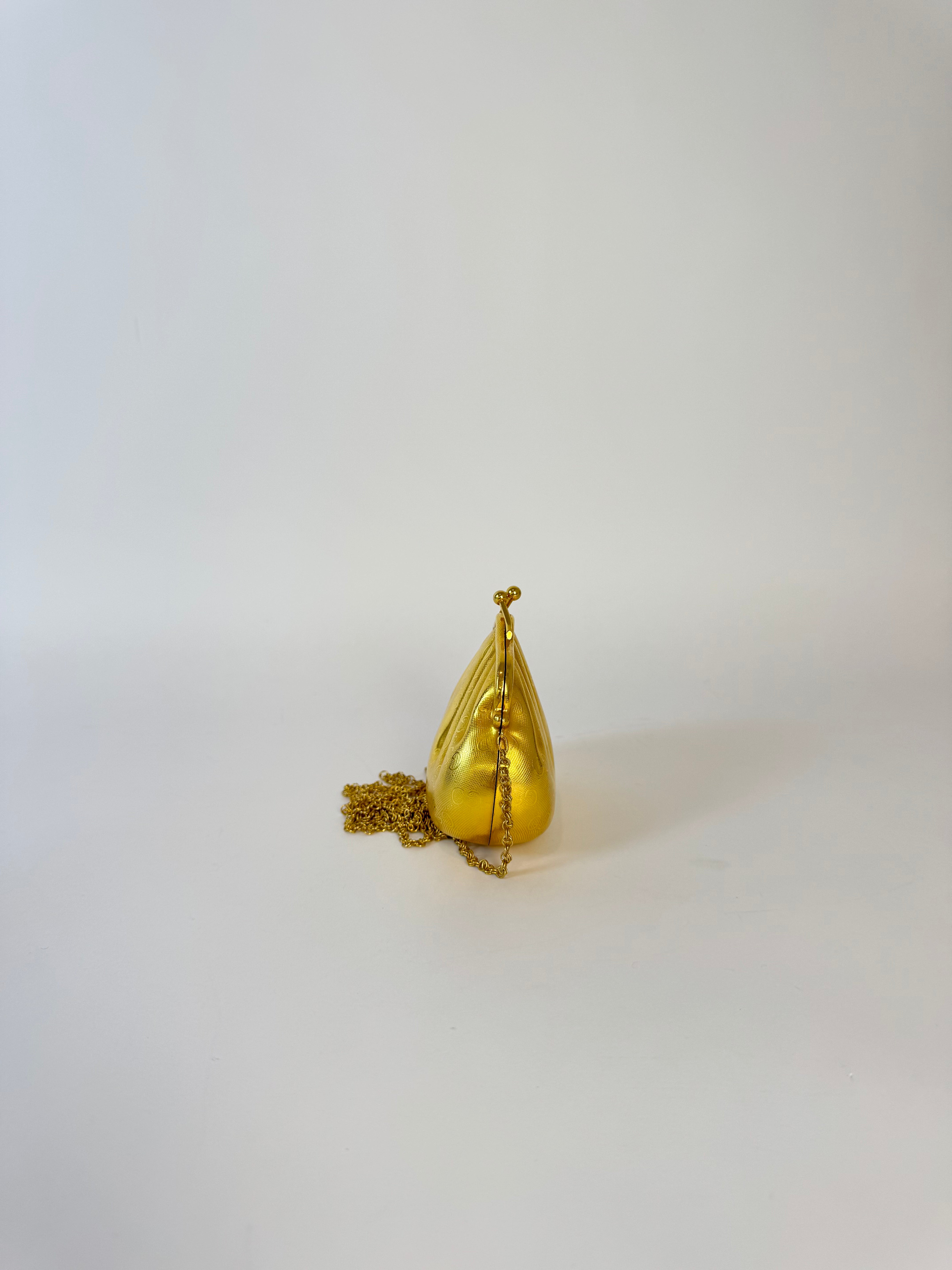 Gucci Gold Shell Clutch Rare Collector’s Piece