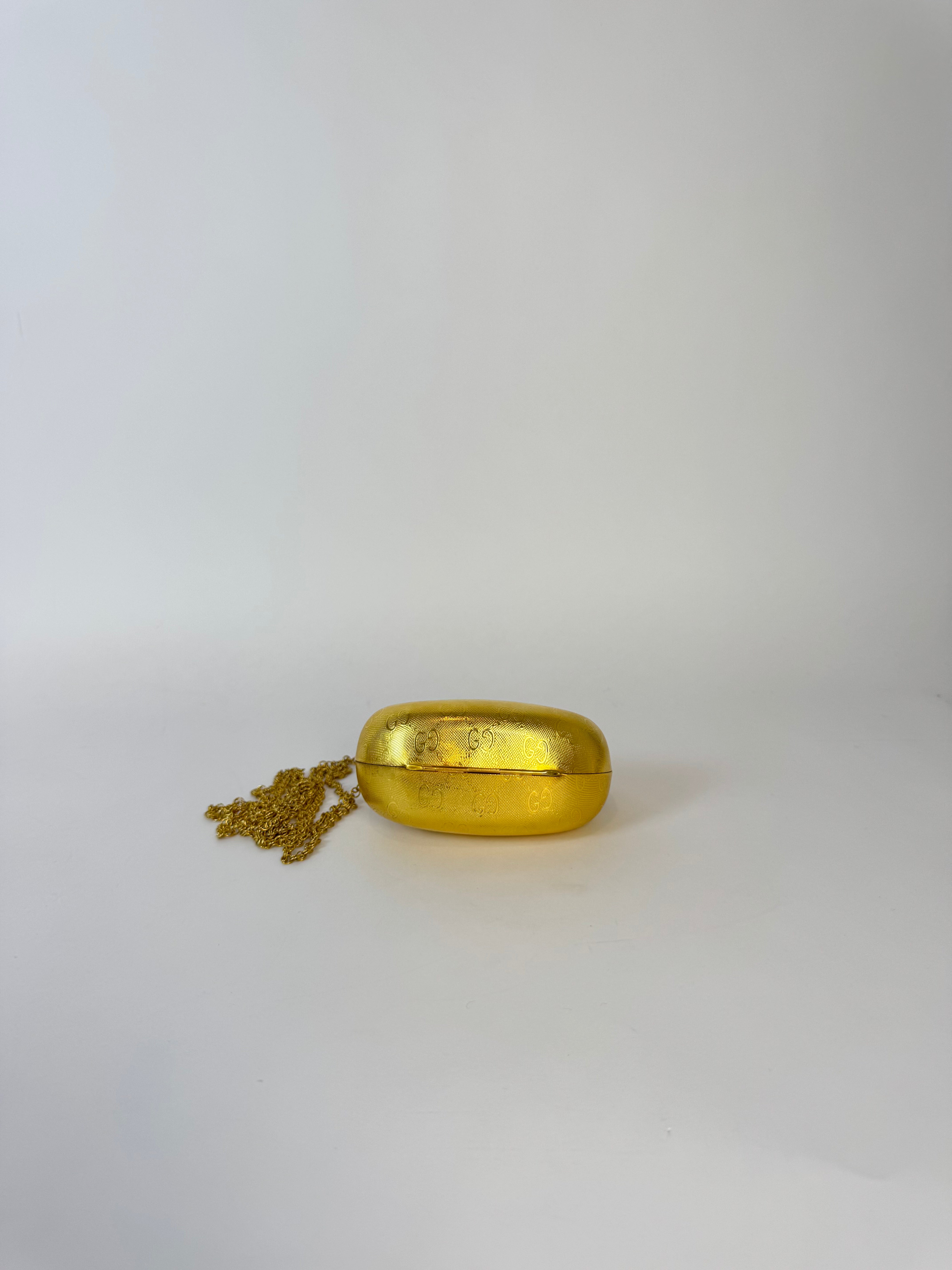 Gucci Gold Shell Clutch Rare Collector’s Piece