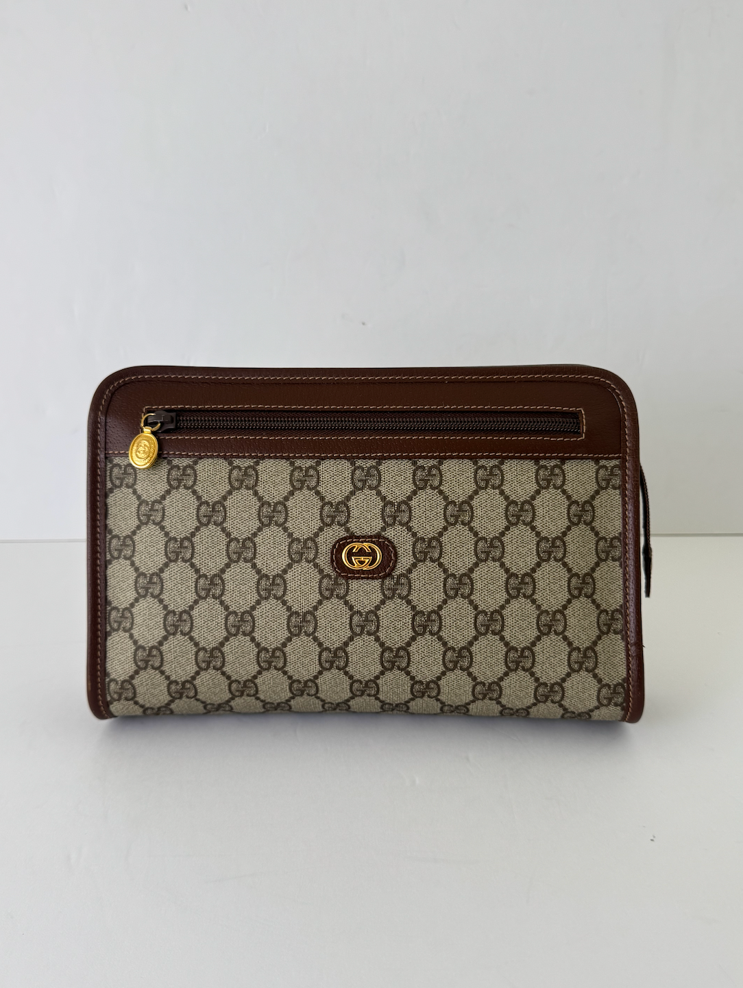 Gucci Monogram Canvas Clutch